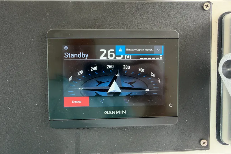 Slide: The Image of Garmin navigation display on 1997 Sea Ray 550 Sedan Bridge, showing standby mode at 265 degrees. - 17