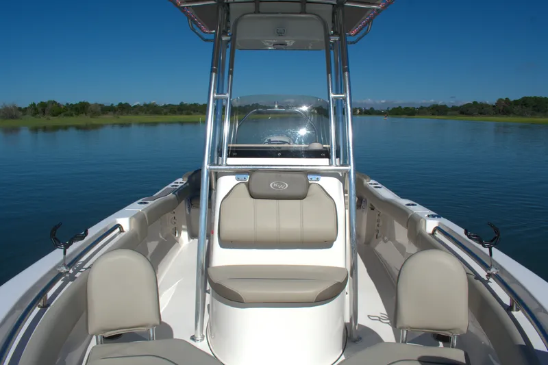 Slide: The Image of 2024 Key West 203 FS boat interior with seating, on calm water. - 7