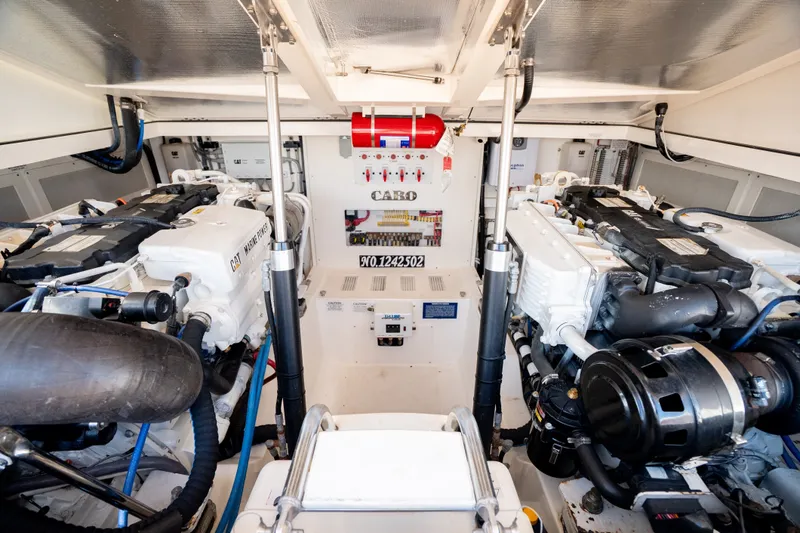 Slide: The Image of Engine room of 2011 Cabo 36 Express boat with dual CAT marine engines. - 44