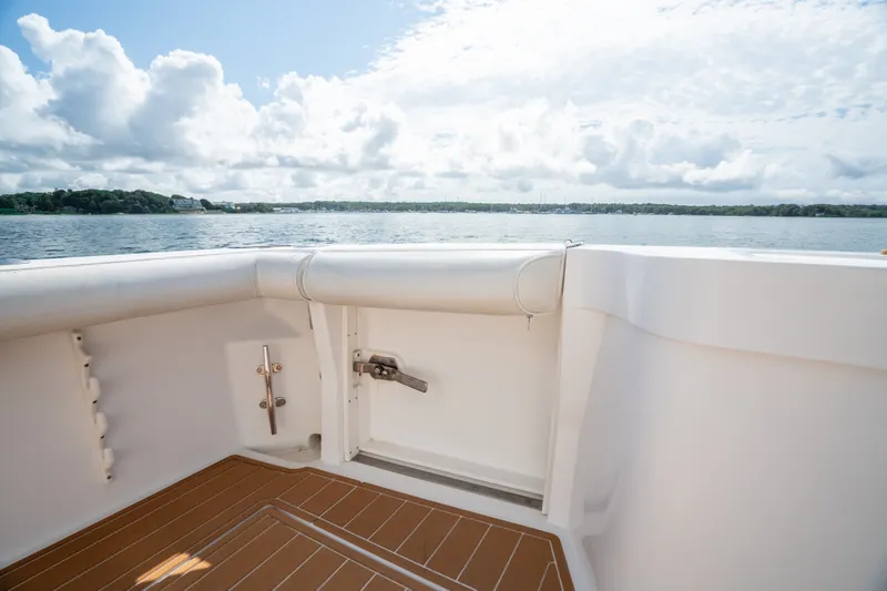Slide: The Image of View from the deck of a 2011 Cabo 36 Express boat on a sunny day. - 26