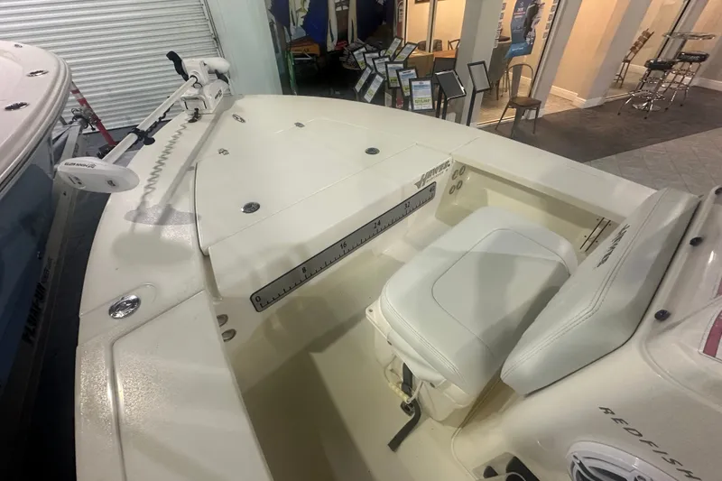 Slide: The Image of 2024 Hewes Redfisher 16 boat interior with seating and measuring ruler. - 6