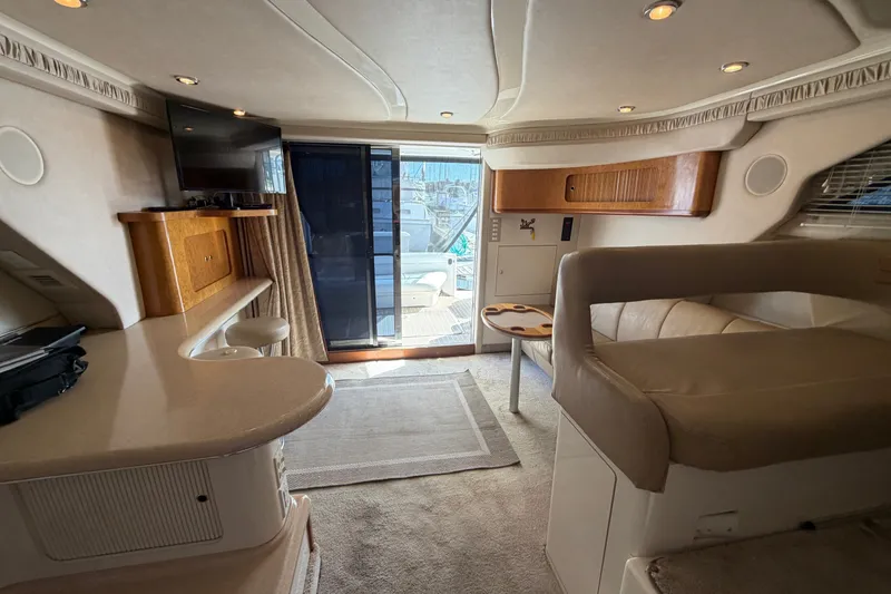 Slide: The Image of Luxurious interior of a 1997 Sea Ray 400 Sedan Bridge yacht with modern amenities. - 27