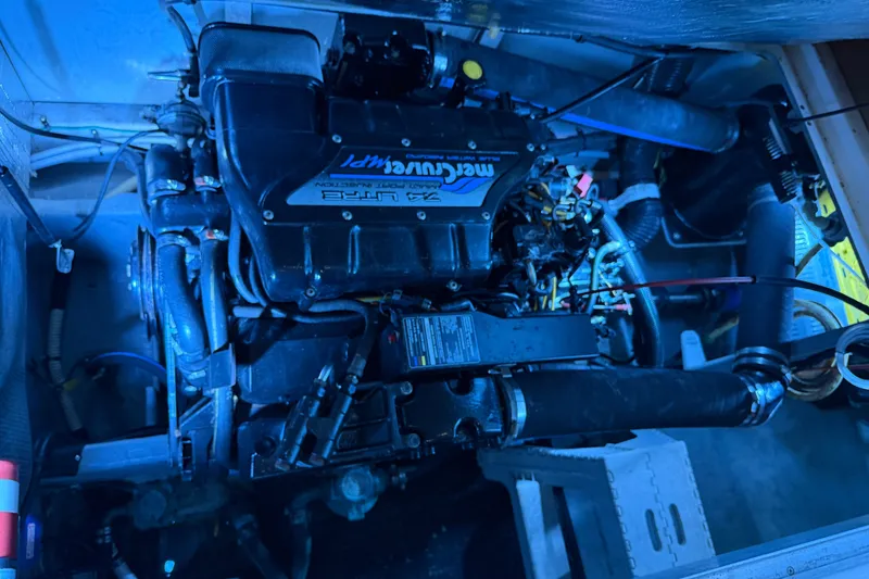 Slide: The Image of Engine compartment of a 1997 Sea Ray 400 Sedan Bridge with MerCruiser engine. - 11