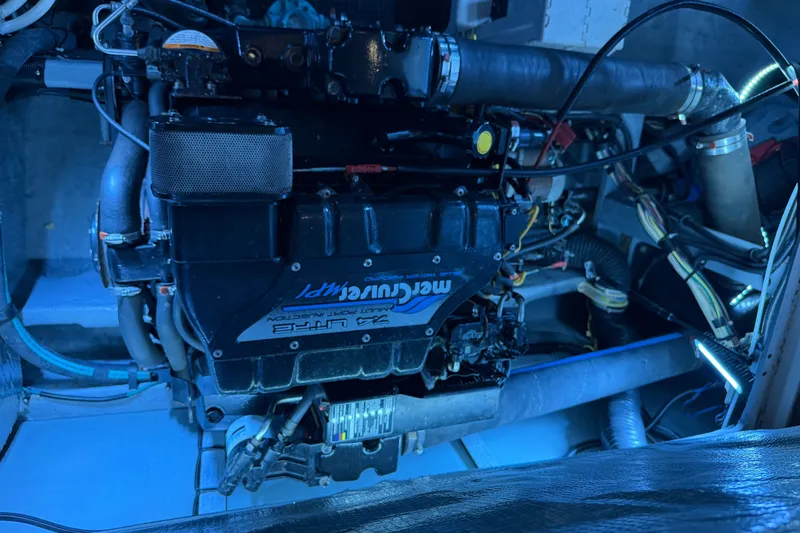 Slide: The Image of Engine compartment of a 1997 Sea Ray 400 Sedan Bridge with MerCruiser engine. - 12