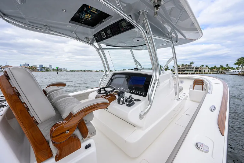 Slide: The Image of 2022 Valhalla V-37 boat interior with modern helm and luxurious seating. - 34