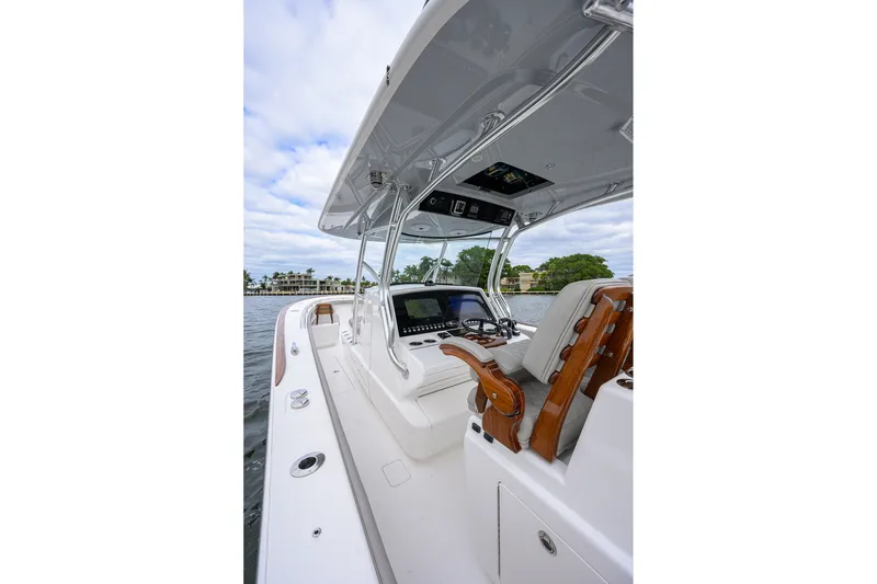 Slide: The Image of 2022 Valhalla V-37 boat interior with sleek design and advanced navigation system. - 32