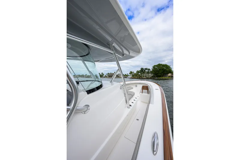 Slide: The Image of 2022 Valhalla V-37 boat deck with sleek design and waterfront view. - 44