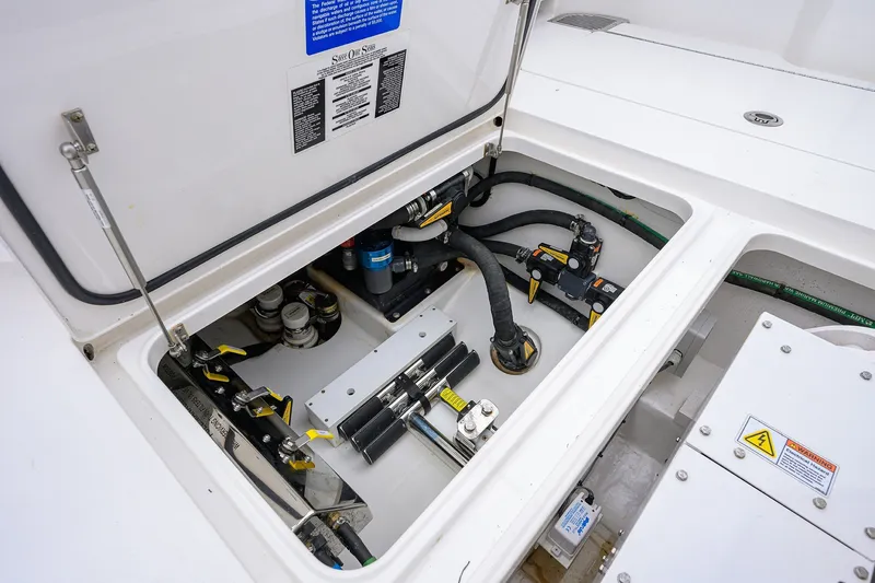 Slide: The Image of Engine compartment of 2022 Valhalla V-37 boat, showcasing mechanical components and wiring. - 29