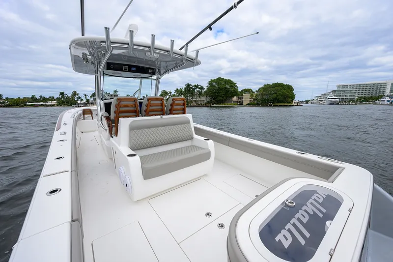 Slide: The Image of 2022 Valhalla V-37 boat on water, featuring sleek design and comfortable seating. - 17
