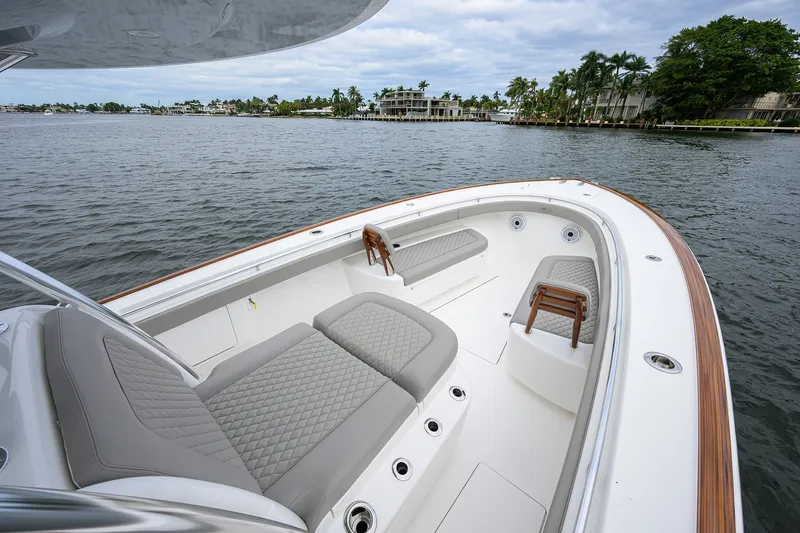 Slide: The Image of Luxurious 2022 Valhalla V-37 boat interior with elegant seating on calm waters. - 45