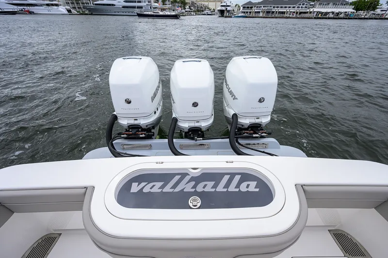 Slide: The Image of 2022 Valhalla V-37 boat with triple Mercury engines on water. - 14