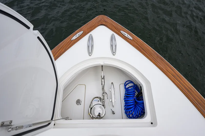 Slide: The Image of Bow of 2022 Valhalla V-37 boat with anchor and coiled blue rope. - 50