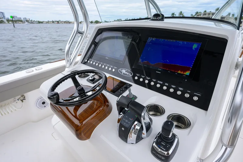 Slide: The Image of Control panel of a 2022 Valhalla V-37 boat with advanced navigation systems. - 35