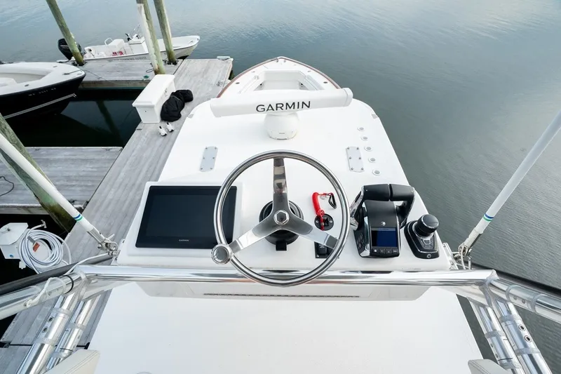 Slide: The Image of 2023 Invincible 39 Open Fisherman boat helm with Garmin navigation system. - 29