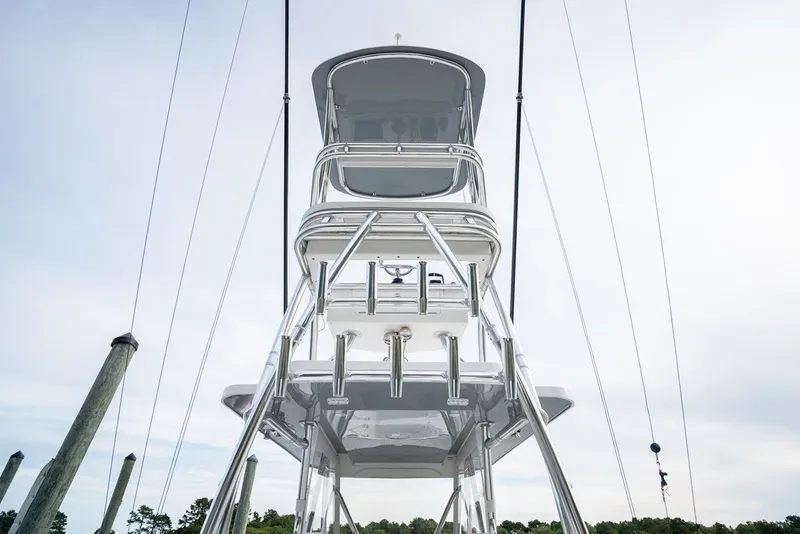 Slide: The Image of 2023 Invincible 39 Open Fisherman boat tower with clear sky background. - 23