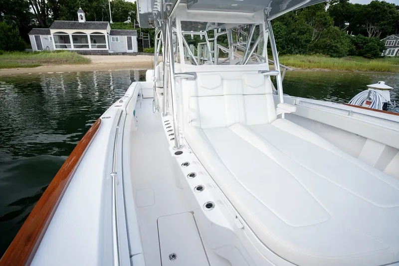 Slide: The Image of 2023 Invincible 39 Open Fisherman boat with sleek white seating and spacious deck. - 17