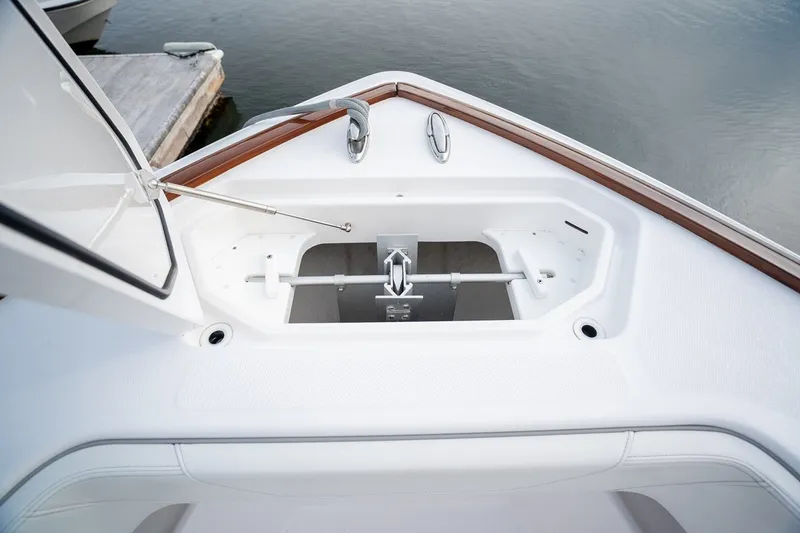 Slide: The Image of 2023 Invincible 39 Open Fisherman boat anchor compartment detail. - 22