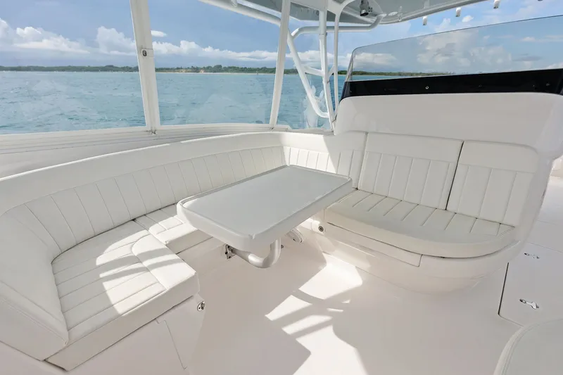 Slide: The Image of Luxurious seating area on a 2019 Intrepid 400 Cuddy boat with ocean view. - 31