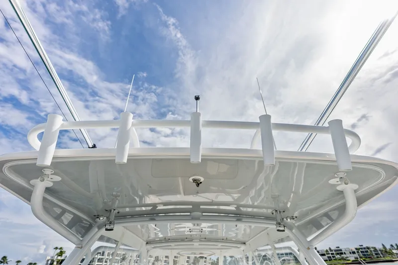 Slide: The Image of 2019 Intrepid 400 Cuddy boat roof against a bright, cloudy sky. - 20