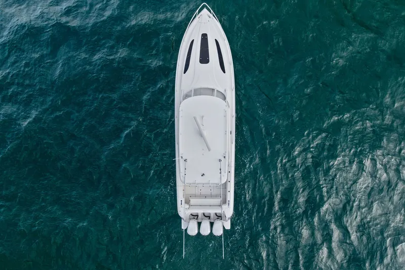 Slide: The Image of Aerial view of 2019 Intrepid 400 Cuddy boat on blue ocean water. - 7