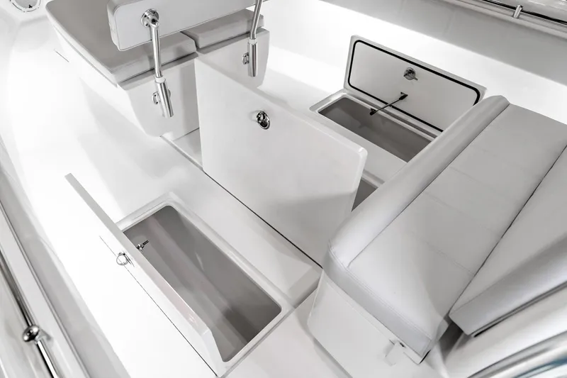 Slide: The Image of Manufacturer Provided Image: 2026 Contender 39 ST boat interior with open storage compartments and seating. - 7