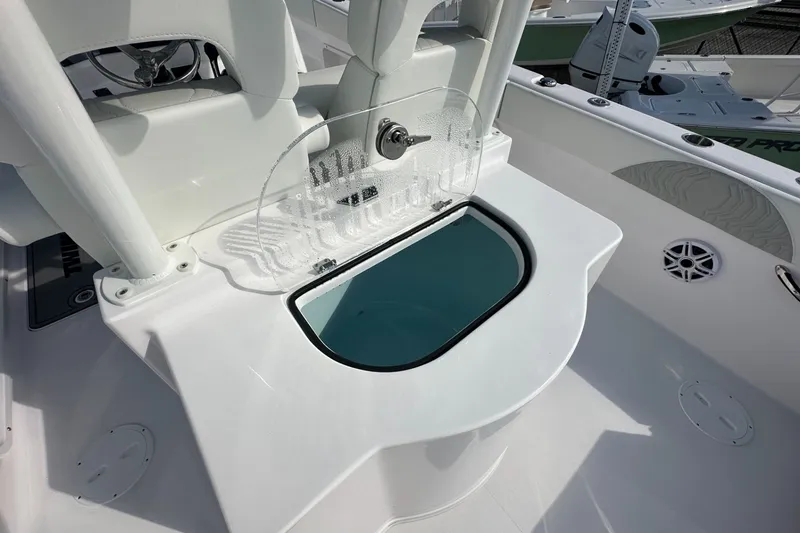 Slide: The Image of Livewell on 2026 Twin Vee 280 GFX2 CC boat, featuring sleek white design. - 11