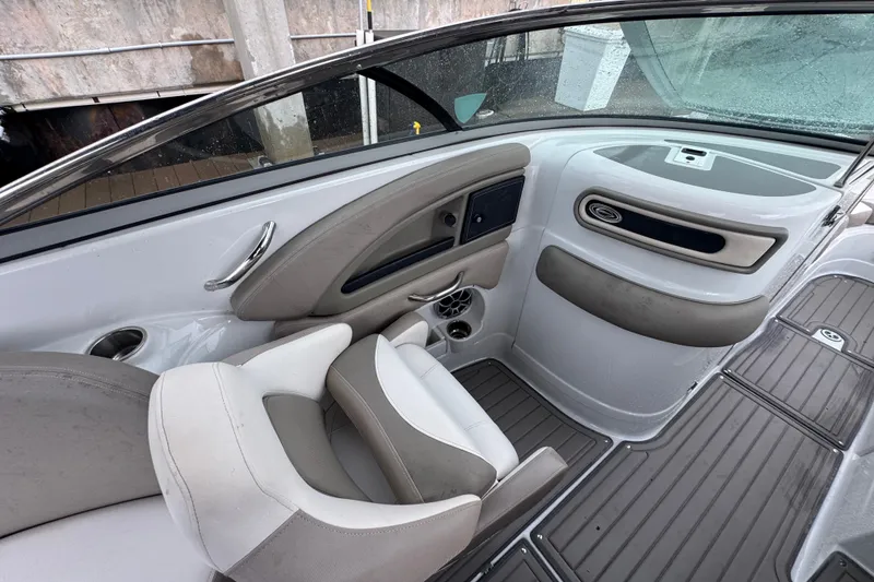 Slide: The Image of 2019 Crownline Eclipse E275 XS boat interior with gray seating and sleek design. - 6