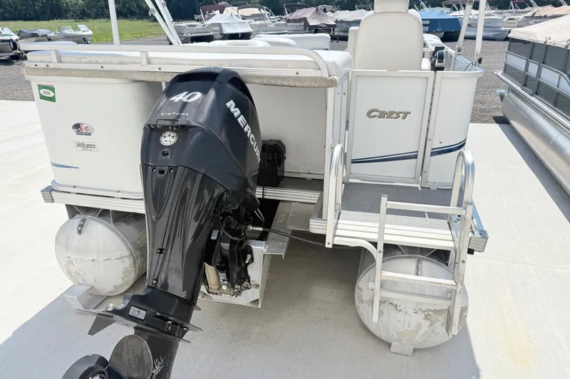 Slide: The Image of 2009 Crest 20 Caribbean pontoon boat with Mercury 40HP outboard motor. - 2