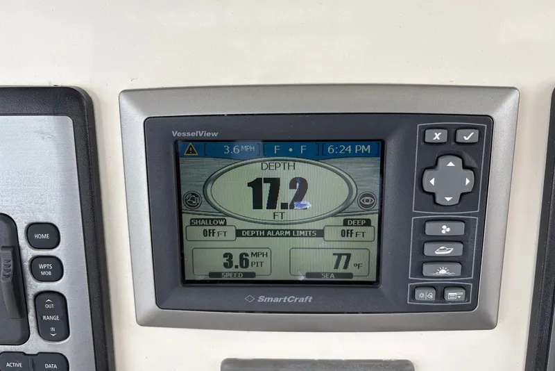 Slide: The Image of SmartCraft VesselView display on 2011 Boston Whaler 320 Outrage showing depth and speed. - 61