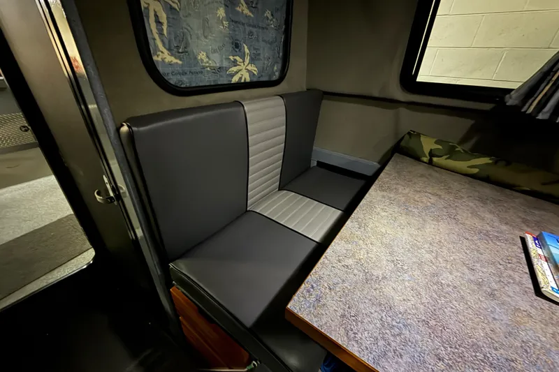 Slide: The Image of Interior of 2012 Wooldridge 29 Super Sport Pilothouse with seating and table. - 19