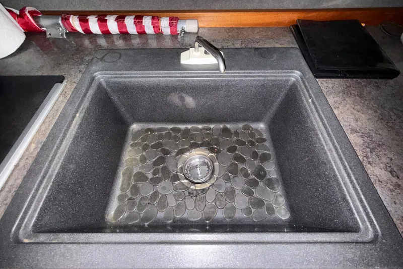 Slide: The Image of Gray kitchen sink with pebble design in a 2012 Wooldridge 29 Super Sport Pilothouse. - 12