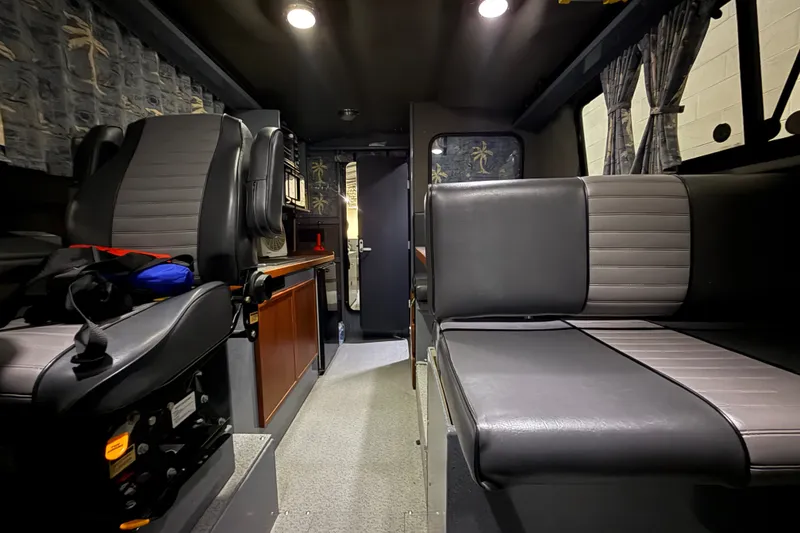 Slide: The Image of Interior of 2012 Wooldridge 29 Super Sport Pilothouse with seating and modern design. - 29
