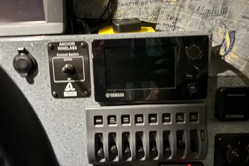 Slide: The Image of Control panel of a 2012 Wooldridge 29 Super Sport Pilothouse boat with Yamaha electronics. - 32
