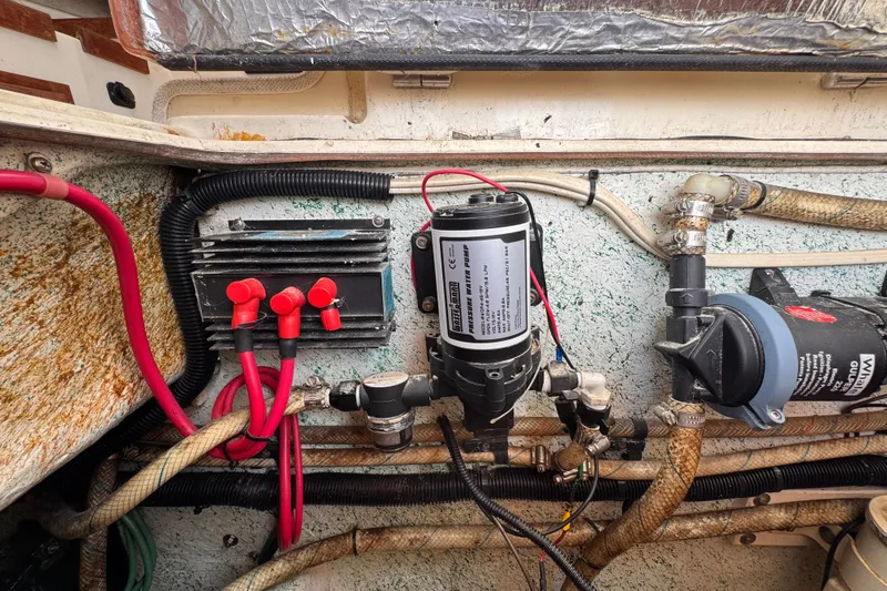 Slide: The Image of Electrical and plumbing components inside a 2005 Atlas Boat Works Acadia 25. - 47