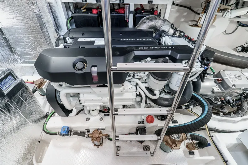 Slide: The Image of Engine room of 2027 Cruisers Yachts 50 Fly, featuring Volvo Penta D8-IPS800 engine. - 90