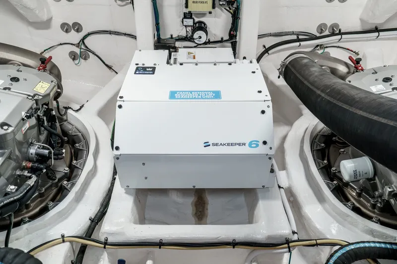 Slide: The Image of Engine room of 2027 Cruisers Yachts 50 Fly featuring Seakeeper 6 stabilizer. - 96