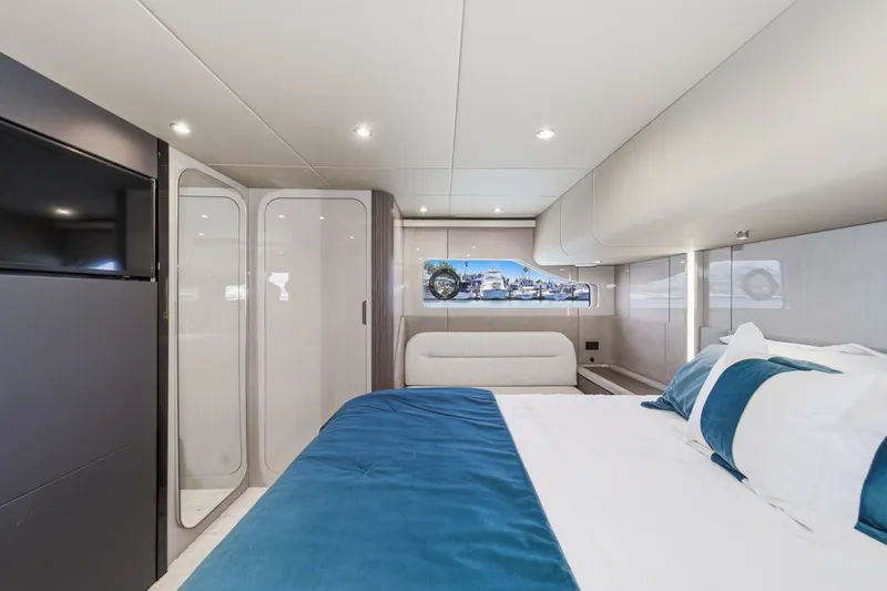 Slide: The Image of Luxurious bedroom interior of 2027 Cruisers Yachts 50 Fly, featuring modern design and elegant decor. - 74