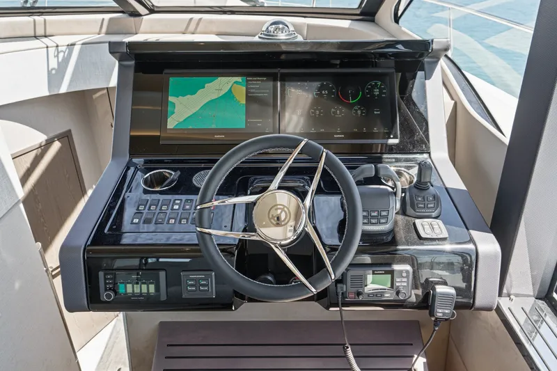 Slide: The Image of 2027 Cruisers Yachts 50 Fly helm with advanced navigation and control systems. - 66