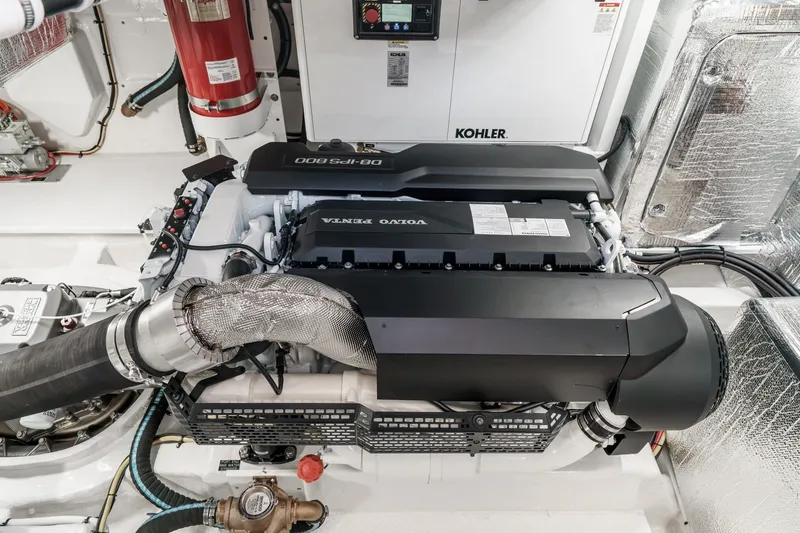 Slide: The Image of Engine room of 2027 Cruisers Yachts 50 Fly with Volvo Penta engine and Kohler generator. - 93