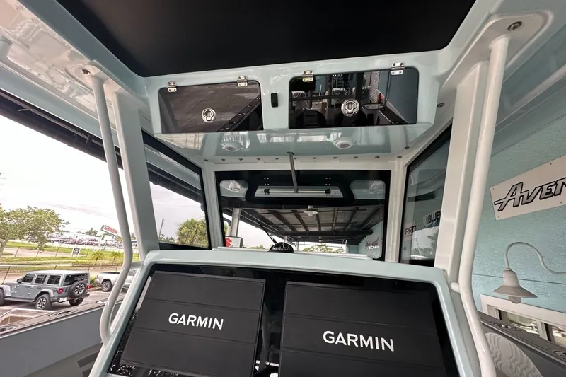 Slide: The Image of Interior view of 2025 Twin Vee 400 GFX2 CC boat with Garmin displays. - 9