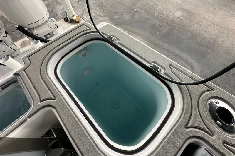 Slide: The Image of Livewell on 2025 Twin Vee 400 GFX2 CC boat, featuring sleek design and functionality. - 14