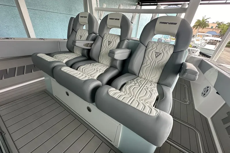 Slide: The Image of Luxurious seating on 2025 Twin Vee 400 GFX2 CC boat, featuring modern design and comfort. - 25