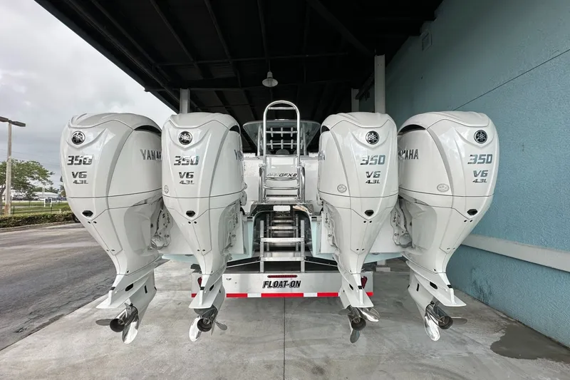 Slide: The Image of 2025 Twin Vee 400 GFX2 CC boat with four Yamaha 350 V6 outboard engines. - 6