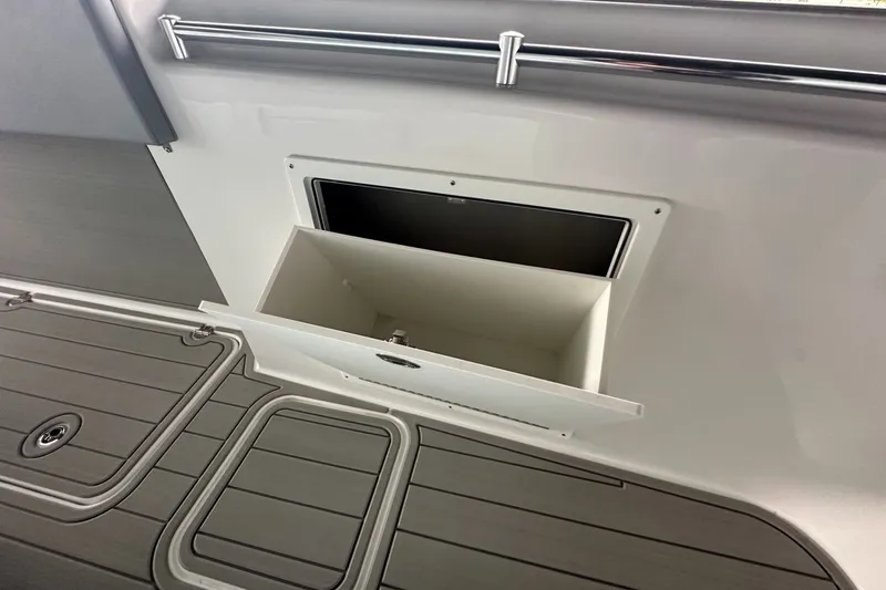 Slide: The Image of Storage compartment on 2025 Twin Vee 400 GFX2 CC boat, featuring sleek design and functionality. - 37