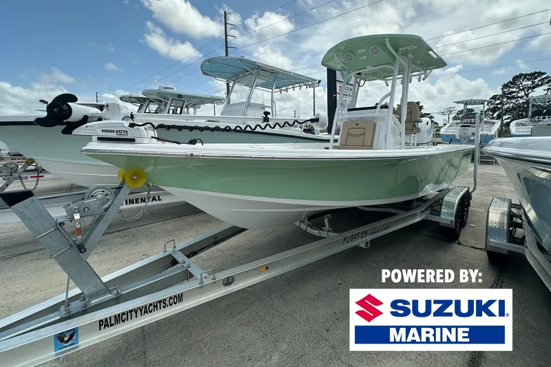 The Image of 2026 Sea Pro 230 Bay boat on trailer, powered by Suzuki Marine. - 0