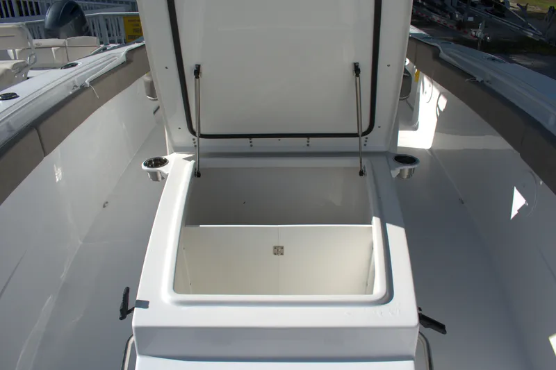 Slide: The Image of Open storage compartment on 2026 Sea Hunt Gamefish 30CB boat deck. - 6