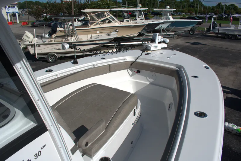 Slide: The Image of 2026 Sea Hunt Gamefish 30CB boat with spacious seating and modern design. - 4