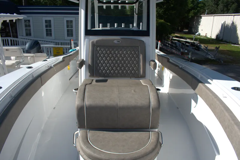 Slide: The Image of 2026 Sea Hunt Gamefish 30CB boat interior with cushioned seating and sleek design. - 5
