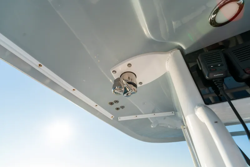 Slide: The Image of 2026 Sea Hunt Gamefish 30CB boat roof detail with mounted equipment and clear sky. - 29