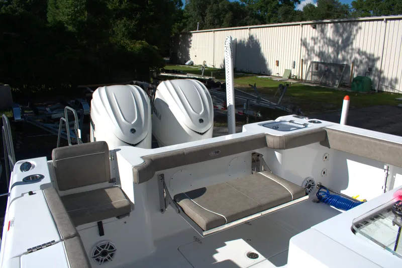 Slide: The Image of 2026 Sea Hunt Gamefish 30CB boat with dual engines and spacious seating area. - 10